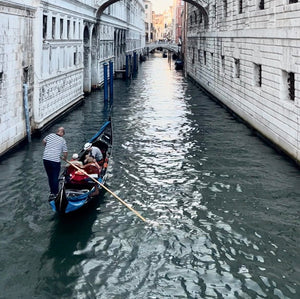 Experience the Magic of a Gondola Ride in Venice