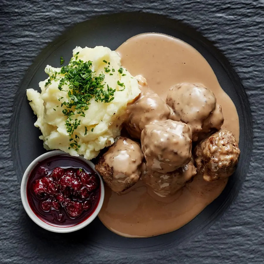 Sweden’s National Dish – Meatballs with Cream Sauce, Potatoes, and Lingonberries