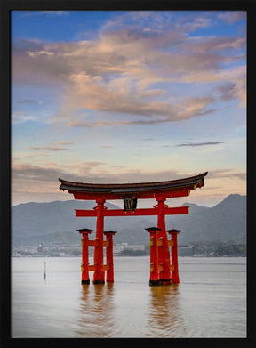 Vermilion Torii of Itsukushima Shrine on Miyajima in the evening Poster