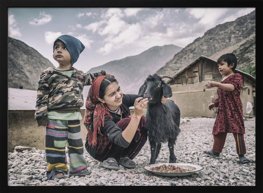 Kids and a goat in the village of Padrud Poster