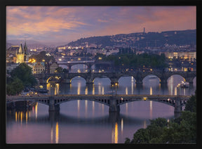 Evening view over the Vltava bridges in Prague Poster