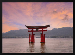 Vermilion Torii of Itsukushima Shrine on Miyajima at sunset Poster