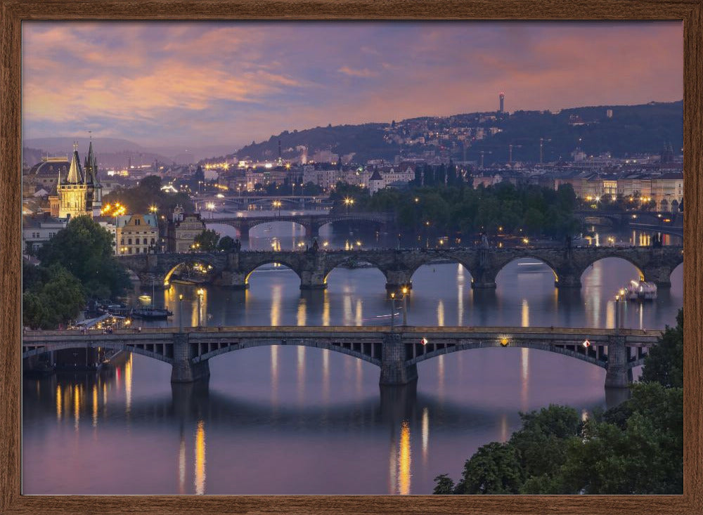 Evening view over the Vltava bridges in Prague Poster