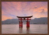 Vermilion Torii of Itsukushima Shrine on Miyajima at sunset Poster