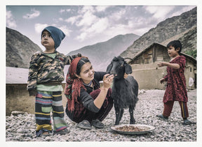 Kids and a goat in the village of Padrud Poster