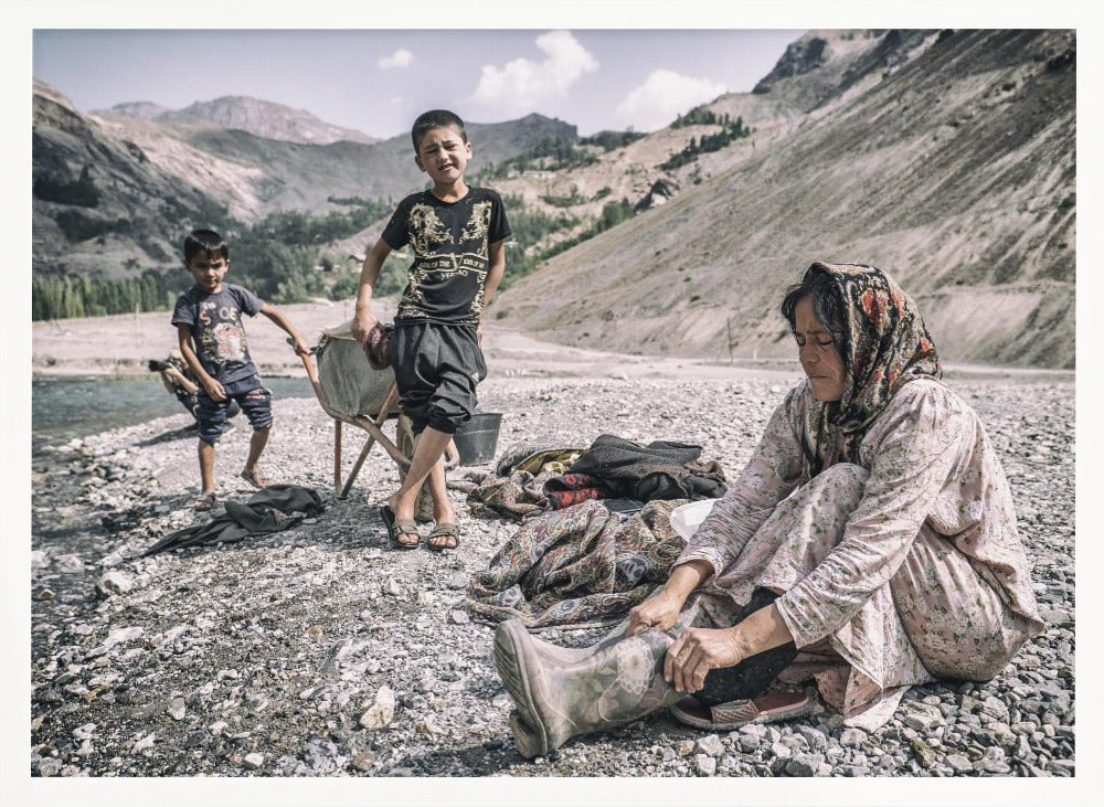 A Tajik woman is preparing to wash in the stream Poster