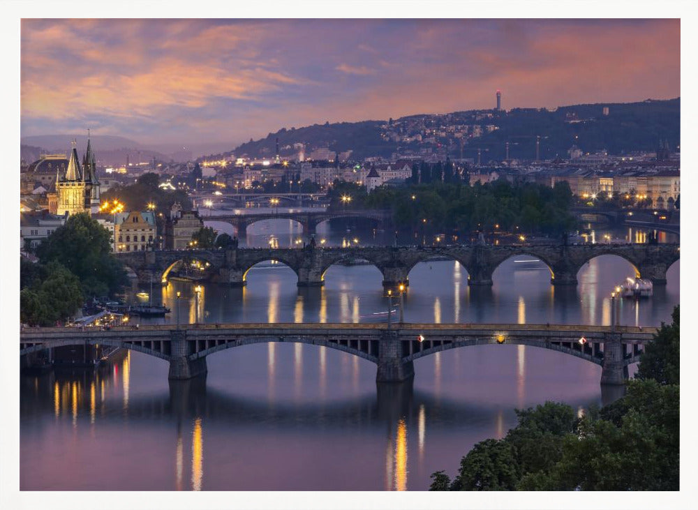 Evening view over the Vltava bridges in Prague Poster