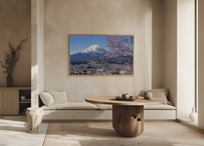 Picturesque view of Mount Fuji during cherry blossom season Poster