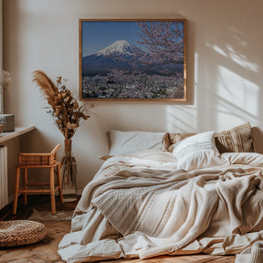 Picturesque view of Mount Fuji during cherry blossom season Poster