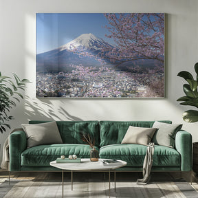 Picturesque view of Mount Fuji during cherry blossom season Poster