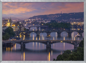 Evening view over the Vltava bridges in Prague Poster