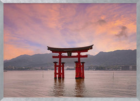 Vermilion Torii of Itsukushima Shrine on Miyajima at sunset Poster