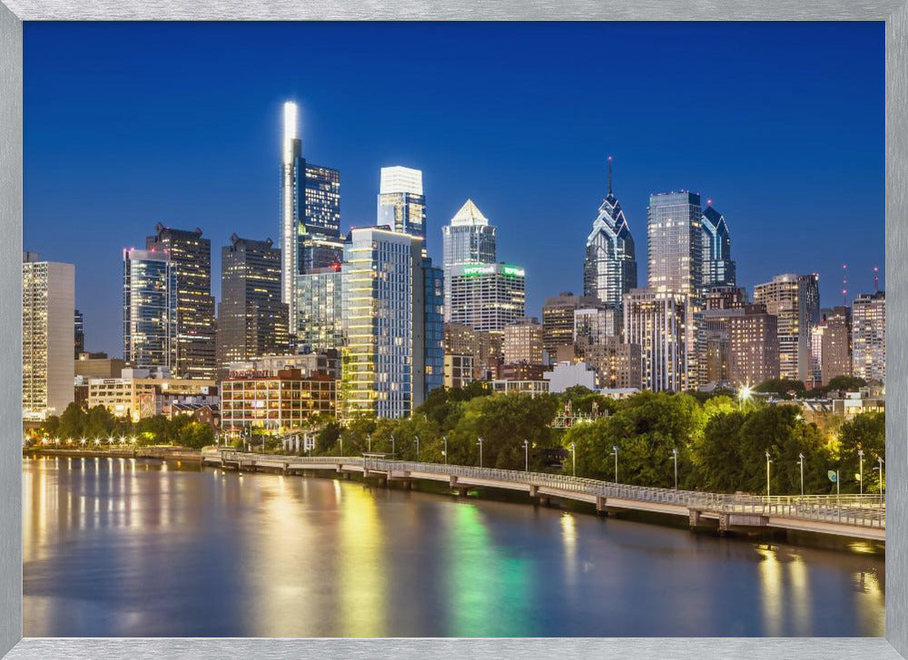 View of downtown Philadelphia from the South Street Bridge in the evening Poster